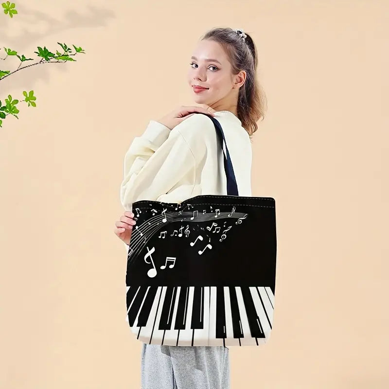 Ce sac à bandoulière à motif de clavier de piano