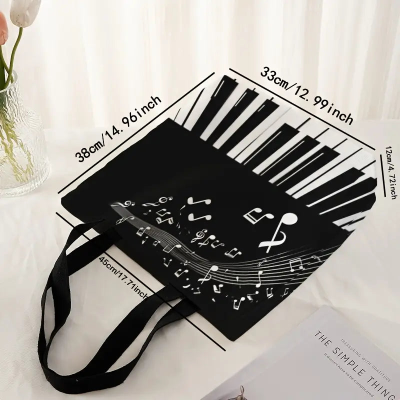 Ce sac à bandoulière à motif de clavier de piano