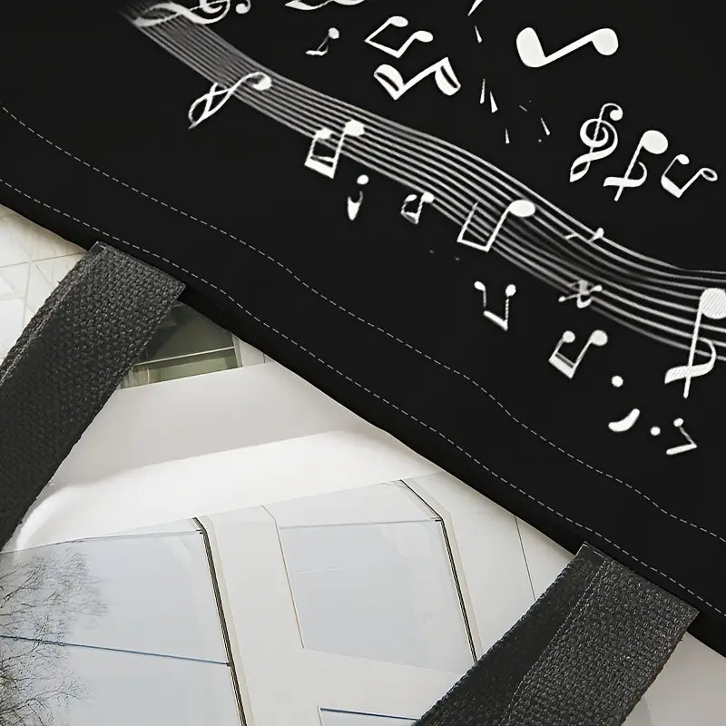 Ce sac à bandoulière à motif de clavier de piano